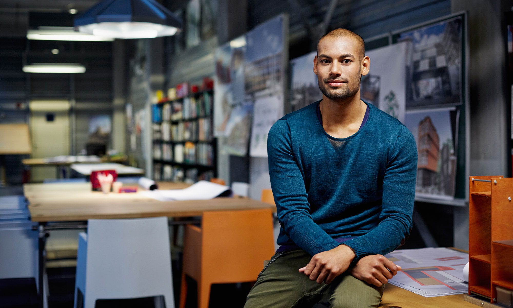 Young man in architect office